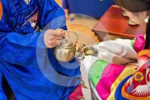 Traditional wedding in Korea. hands of the groom