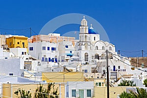 Traditional white architecture village on the center of Santorini island, Pyrgos Kallistis, Greece.