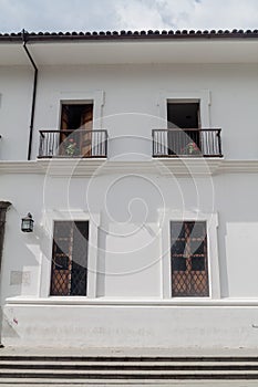 Traditional white building in colonial city Popayan