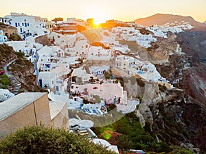 Traditional white cave houses on a cliff on the island Santorini