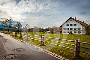 Traditional white house in the countryside of Bavaria, Germany