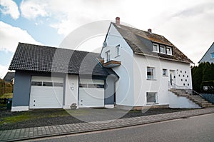 Traditional white house in the countryside of Bavaria, Germany