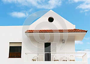 Traditional white house, villa with balcony in La Frontera, Tigaday of El Hierro Island. Facade detail, doors and windows.