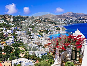 Traditional white houses,flowers and sea,Agia Marina village,Leros,Greece.