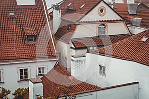 Traditional white houses with red roof in Prague