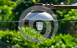 Traditional white lamp with metallic lamppost