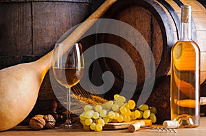 Traditional white wine and barrels