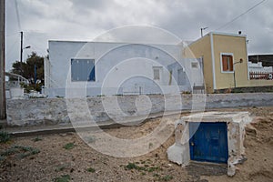 Traditional Whitewashed Greek Houses by the Sea in Mandrakia, Mi