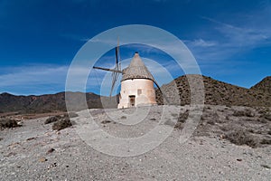 Traditional Windmill in Cabo de Gata Natural Park, Spain photo