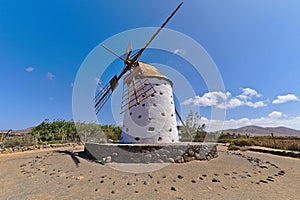 Traditional windmill on Fuerteventura with windmill sail.