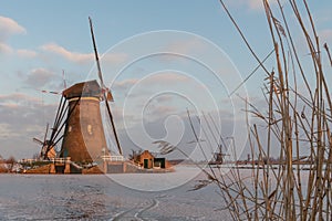 Traditional windmill and ice, Kinderdijk, Netherlands