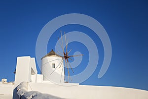 Traditional windmill in Oia on Santorini island, Greece