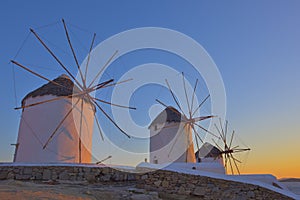 Traditional windmill at twilight in Greece