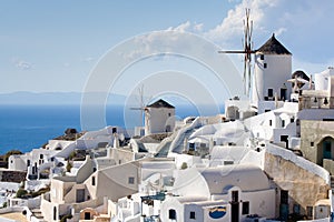 Traditional windmills in village Oia of Santorini