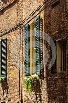 Traditional window in Monteriggioni, Tuscany,  Italy