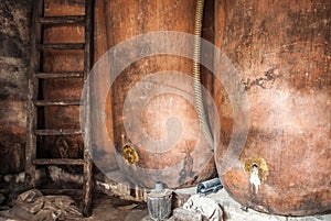 Traditional wine cellar with barrels in disrepair