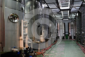 Traditional winery bodega on south of La Palma island with steel or concrete casks and wooden barrels in wine cellars, wine