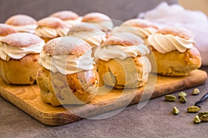 Traditional winter sweet: Semla semlor or fastlagsbulle flavored with cardamom, filled with almond paste & whipped cream