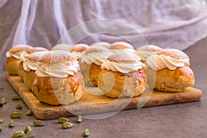 Traditional winter sweet: Semla semlor or fastlagsbulle flavored with cardamom, filled with almond paste & whipped cream