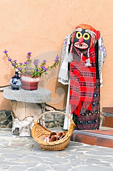 Traditional woman folk costume with mask, Romania, Europe