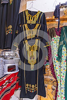 Traditional women\'s clothes at a market in Unaizah