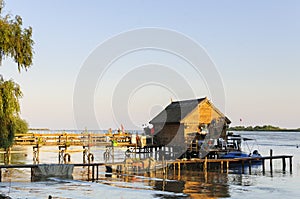 Traditional wood house on water