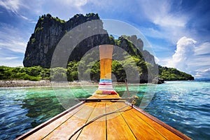 Traditional Wooden Boat in Koh Phi Phi Island, Thailand photo