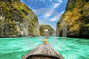 Traditional wooden boat in a picture perfect tropical bay on Koh Phi Phi Island, Thailand, Asia