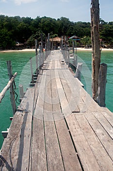 Traditional wooden bridge on the beach.