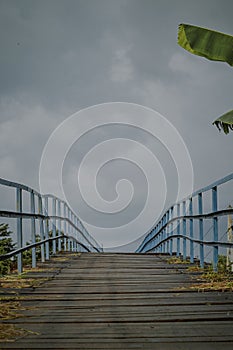 A Traditional wooden bridge in Indonesia