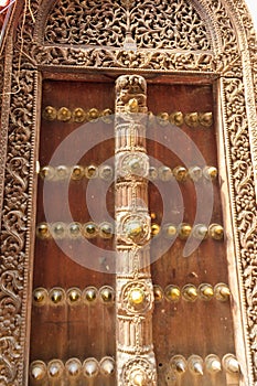 Traditional wooden carved door in Stone Town, Zanzibar, Tanzania