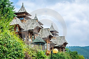 Traditional wooden cottages at Sarganska osmica railroad station, Serbia