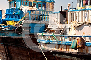 Traditional wooden dhows boats in Dubai creek