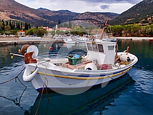 Traditional Wooden Greek Fishing Boat in Village Harbor, Greece