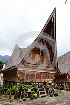 Traditional wooden house of Batak people of the Tarot located in Lingga village and Lake Toba, North Sumatra, Karo Regency, photo