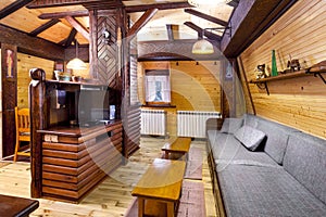 Traditional wooden interior with table and fixtures - mountain resort photo