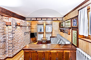 Traditional wooden interior with table and fixtures - mountain resort