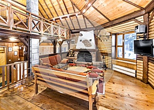 Traditional wooden interior with table and fixtures - mountain resort photo