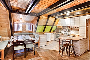 Traditional wooden interior with table and fixtures - mountain resort