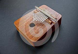 Traditional wooden kalimba isolated on black