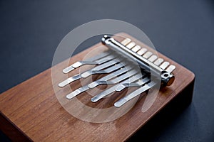 Traditional wooden kalimba isolated on black