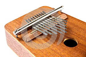 Traditional wooden kalimba isolated on white