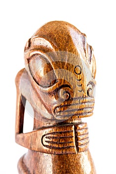 Traditional wooden Polynesian tiki from Marquesas Islands. White background