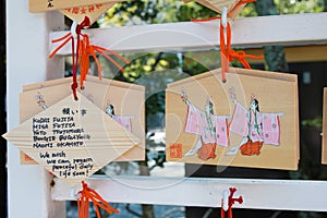 Traditional wooden prayer tablet Ema at Sarutahiko Shrine in Ise, Mie, Japan