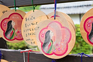 Traditional wooden prayer tablet Ema at Zuishin-in Temple in Kyoto, Japan. The temple was founded