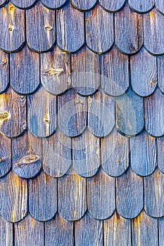 Traditional wooden roof tile of an old house in the Skansen open-air museum in Stockholm, Sweden....IMAGE