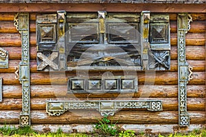 Traditional wooden Russian carved platband of an old wooden hous