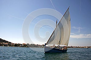 Traditional wooden sailboat during the regatta Latin Sail