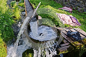 Traditional wooden washing machine - Maramures, landmark attraction in Romania