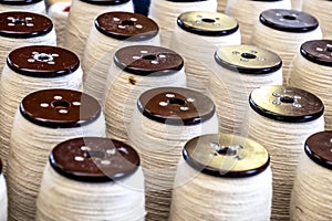 Traditional wool reels of the british waving and textile industry